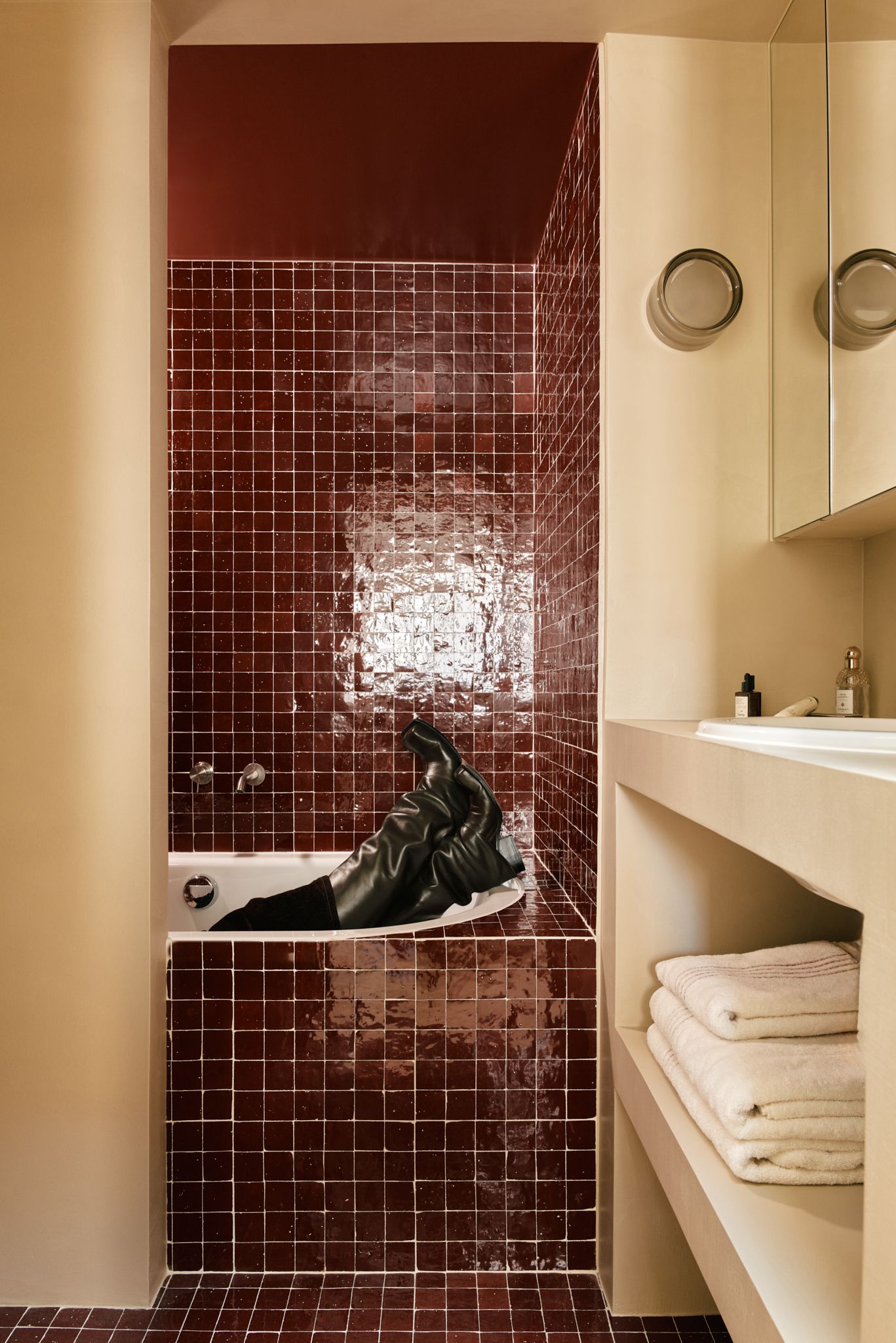 Image may contain Bathing Indoors Tile and Person