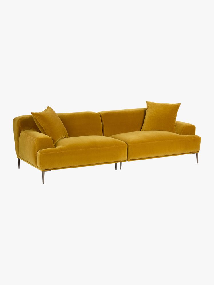Image may contain: Couch, Furniture, Cushion, and Home Decor