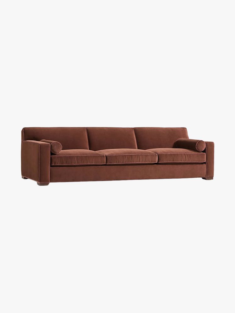 Image may contain: Couch, Furniture, Cushion, and Home Decor